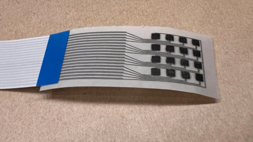 Conductive traces and sensing pads on a flexible NanoPaper sheet.